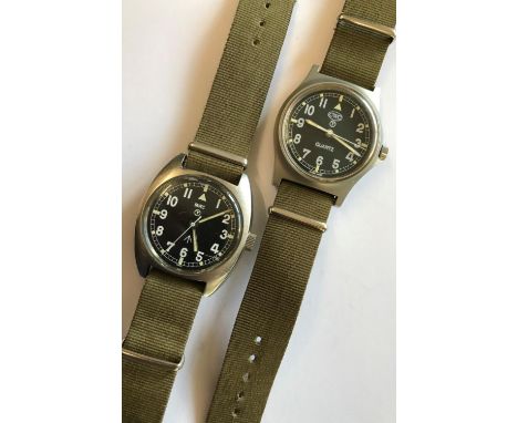 TWO MILITARY ISSUE STAINLESS STEEL GENTLEMAN'S WRISTWATCHES. Two similar CWC Military Issue wristwatches each with black dial