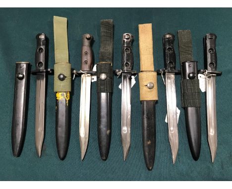 A COLLECTION OF FIVE LIA3 AND SIMILAR BAYONETS AND SCABBARDS. Five similar LIA 3 type SLR rifle bayonets and scabbards, each 