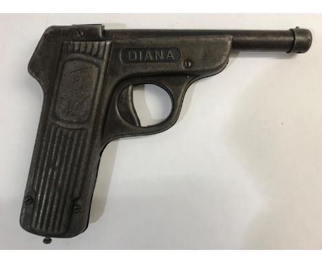 AN EARLY GERMAN DIANA AIR PISTOL. An unusual first model German Diana Air Pistol engraved to the handle with an image of the 