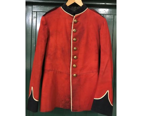 A PRINCE ALBERT'S SOMERSET LIGHT INFANTRY UNIFORM. A scarlet 'other ranks' tunic and blue trousers with red stripe. The tunic