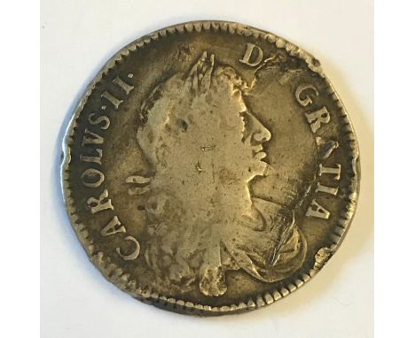 A CHARLES II HALFCROWN. A Charles II Halfcrown dated 1671, third bust r, reverse with conjoined Cs in angles. Regnal year V. 