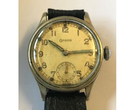 A GRANA MILITARY ISSUE WRISTWATCH. A stainless steel wristwatch, the white dial with Arabic numerals and subsidiary seconds d