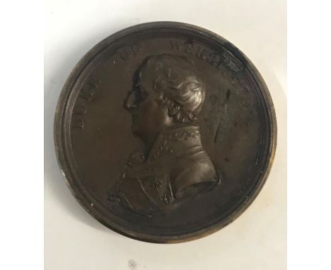 A DUKE OF WELLINGTON'S VICTORIES MEDAL AND PAPER DISCS. A two part circular box of medal form, the lid with bust length portr