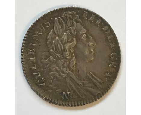 A WILLIAM III SIXPENCE. A William III Sixpence dated 1696, first draped bust r, N for Norwich Mint below the bust, reverse wi