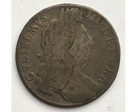 A WILIAM III HALFCROWN. A WILLIAM III Halfcrown dated 1697, laureate and draped bust r, regnal year to rim Nono.