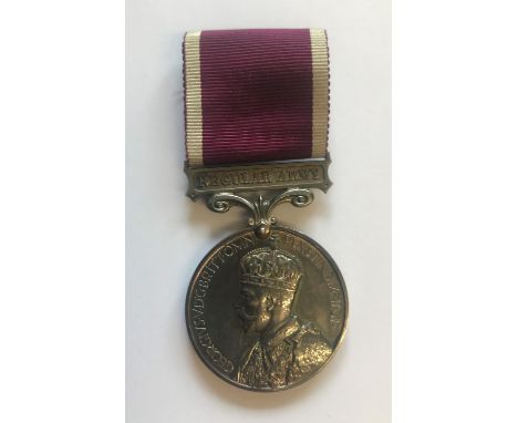A GEORGE V LONG SERVICE AND GOOD CONDUCT MEDAL. A George V Long Service and Good Conduct Medal with fixed suspension and 'Reg