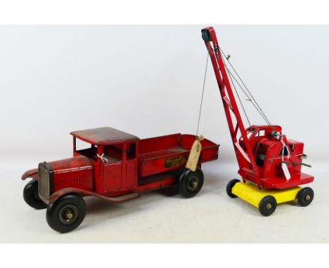 Tri-ang - 2 x vintage Tri-ang pressed steel models, a Bedford tipping lorry measuring 49 x 18 x 18 cm. It appears to have bee