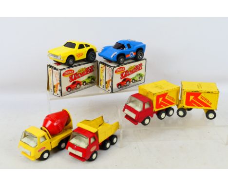 Tonka - 5 smaller scale (averaging 13cm long) Tonka Tinplate vehicles to include Cement mixer, Dump Truck, twin trailer wagon