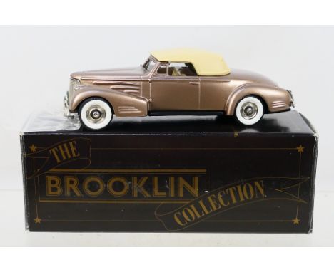 Brooklin - A 1:43 scale 1940 Cadillac V16 Convertible Coupe # BRK 14. The model appears Mint in a Good box. (This does not co