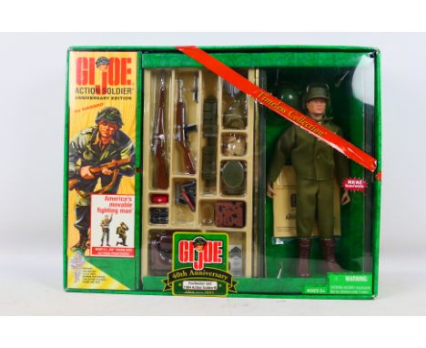 Hasbro - A boxed G.I. Joe Men of Action 40th anniversary set Footlocker and 1964 Action Soldier. Item appears mint in box. Ho