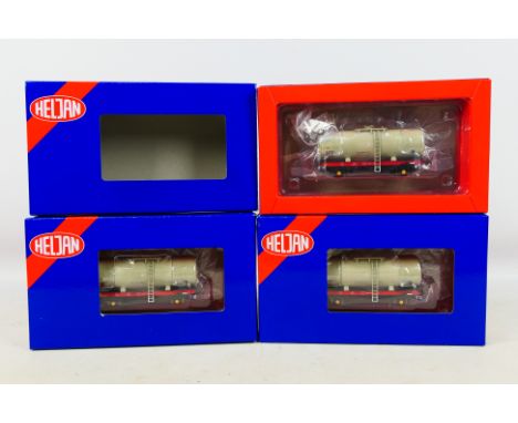 Heljan - 3 x boxed OO gauge Esso tank wagons in grey 1980s era livery # 1153. They appear Mint in Near Mint boxes. (This does