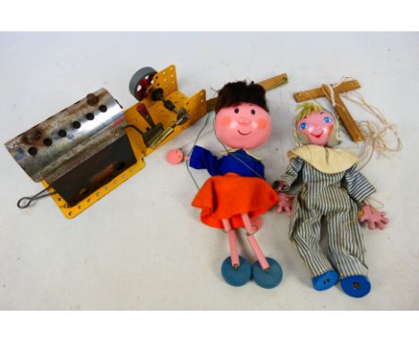 Meccano - Pelham - A live steam Meccano Stationary Engine, a Pelham Magic Roundabout Florence ad another Pelham puppet. They 