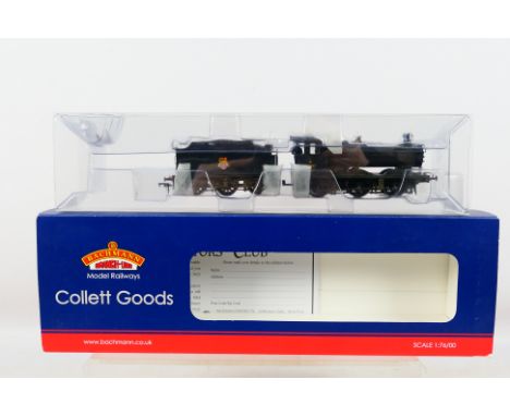 Bachmann - A boxed OO gauge Collett Goods number 2259 in BR black livery # 32-311. It appears in Very Good overall condition,