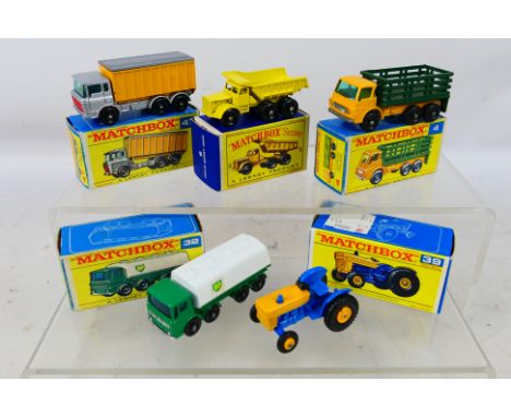 Matchbox by Lesney - five diecast models comprising Stake Truck # 4, Euclid Quarry Truck # 6, Leyland Petrol Tanker # 32,  Fo