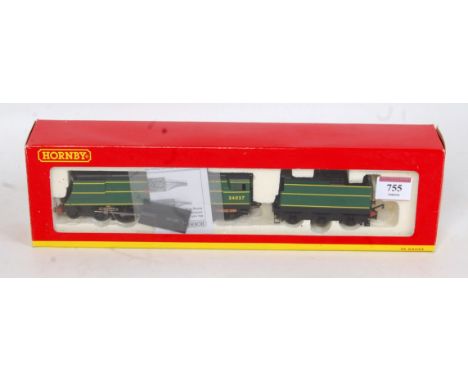 A Hornby R2315 Bulleid West Country class engine and tender Malachite green, no insignia No. 34037 'Clovelly' (M-BNM)