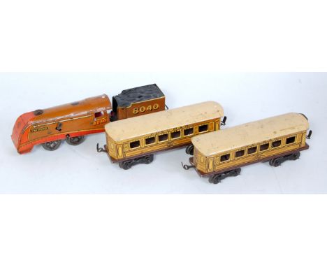 Brimtoy "A4" 0-4-0 streamlined loco and tender "King George 8040", brown and red with two pullman bogie coaches, overall (G)