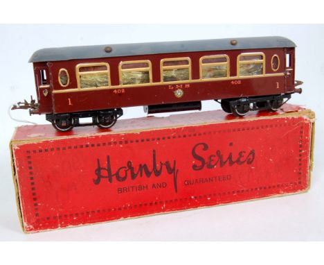 1930-41 Hornby saloon coach LMS, all door handles present, celluloids heavily distorted, a few marks, wheels starting to dete