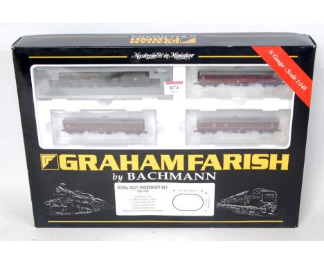 A Graham Farish by Bachmann N gauge 'Royal Scot Passenger Set' Ref. 370-100 containing BR green 'City of London' engine and t