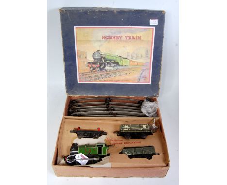 Post-war Hornby clockwork goods tank set no. 101 LNER 460 loco, timber wagon and two NE open wagons, one in place of tank wag