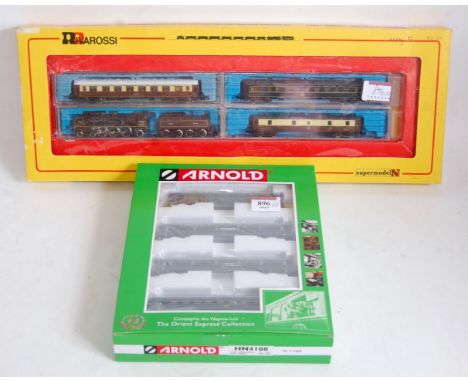 A Rivarossi N gauge continental outline NORD brown 4-6-2 engine and tender and 3 Wagons Lits livery carriages (NM-BNM) sold w