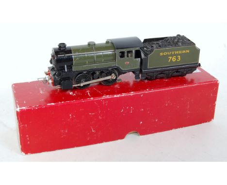 A Trix Twin with pre-war couplings freelance Southern 0-4-0 engine and tender olive green number 763 some paint loss to loco,