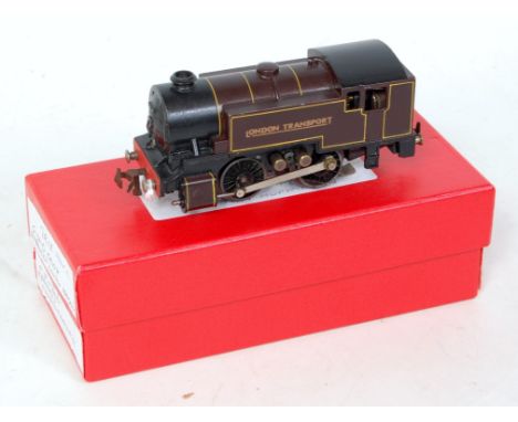 A Trix Twin 3-rail renovated freelance 0-4-0 tank engine repainted as London Transport maroon (GR) and sold with set of 3 sho