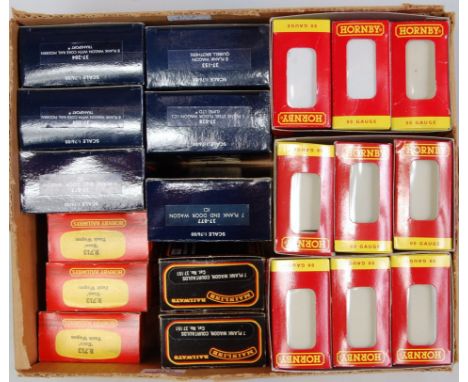 Box containing 20 wagons including 3 Hornby three wagon packs R6154, R6153, R6151A, 6 Bachmann and 5 other items (G-BG)