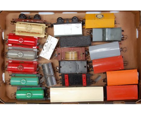 Large tray containing 19 Hornby pre-war and post-war wagons and tanks, including 3 x repainted Seccotine vans, repainted no. 