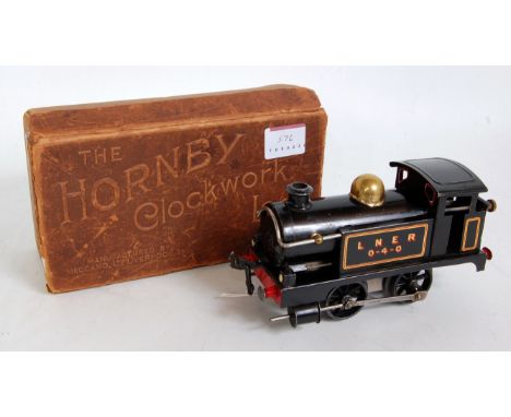 1925-6 Hornby no. 1 clockwork 0-4-0 loco LNER, 0-4-0 on tank sides, brass dome, detailed smoke box door, red lined cab window