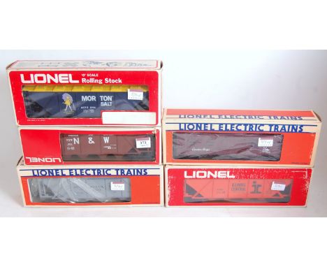 Five Lionel goods wagons: N AND W hopper 9111; Morton Salt 9114; CP bunk car 6-5728; IC covered hopper 6-9264; Pennsylvania c