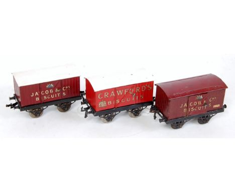 Three Hornby open axle guard goods vans:- repainted Crawfords, red body white roof (G) as repaint; Jacobs Biscuits 1924-5 mar