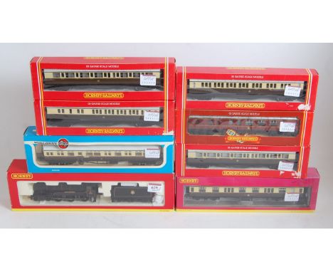 A Hornby R2558 BR black "County of Breckrock" engine and tender, together with 3 x R456, R457, R4505 GWR brown/cream coaches 