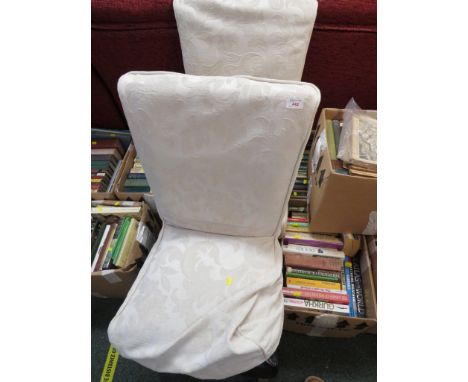 A PAIR OF LIGHT WOOD LEATHER CLAD DINING CHAIR WITH FABRIC COVERS.
