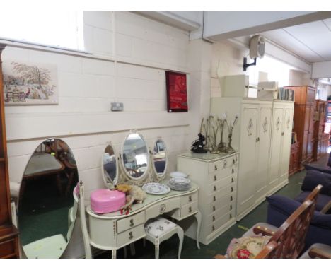 A FRENCH STYLE SUITE OF BEDROOM FURNITURE IN CREAM AND GILT EFFECT WITH LIMOGES STYLE PANELS,  COMPRISING A PAIR OF DOUBLE WA