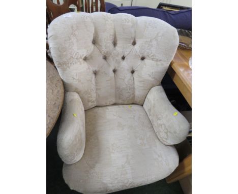 BEIGE BUTTON BACK UPHOLSTERED ARMCHAIR.