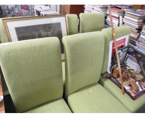 SET OF SIX LIGHT OAK FRAMED DINING CHAIRS CLAD IN PALE GREEN UPHOLSTERY.