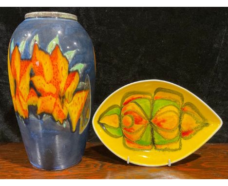 A large Poole Studio Pottery ovoid vase, painted by Jane Brewer, signed, with stylised flowers, in orange and yellow on a mot