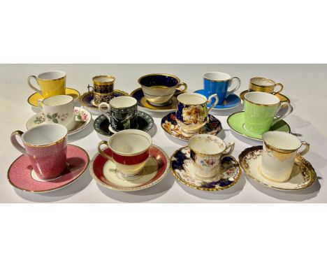 A George V Aynsley coffee cup with silver mount and handle, London 1913, saucer ensuite; other 20th century cups and saucers,