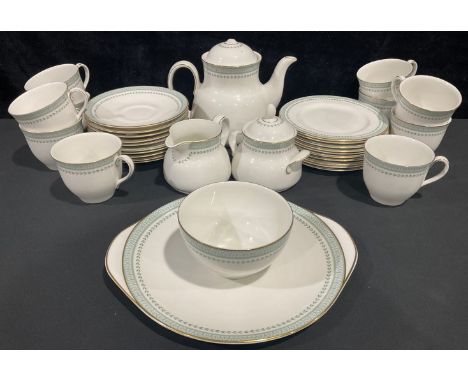 Ceramics - a Royal Doulton Berkshire pattern tea service for ten, comprising teapot, teacups, saucers, cake plates, sucrier, 