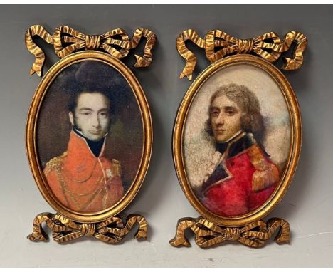 A pair of contemporary neoclassical style giltwood oval portrait miniature frames, moulded and carved, each with ribbon tied 