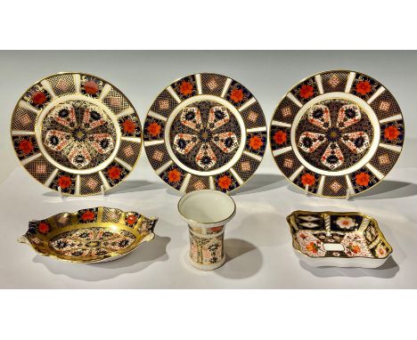 A set of three Royal Crown Derby Imari 1128 pattern tea plates; a shaped oval trinket tray with solid gold band; miniature va