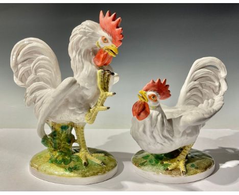 A pair of Italian model cockerels by Ugo Zaccagnini, signed, the tallest 23cm 
