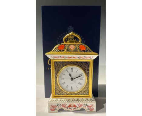 A Royal Crown Derby 1128 Old Imari pattern mantel clock, 18cm high, boxed, second quality 