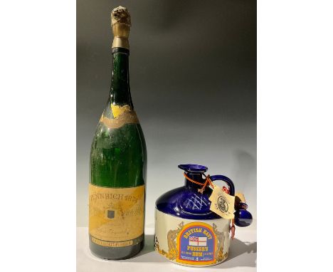 A ceramic flagon of British Navy Pusser's Rum, 1.75 litres, with contents; a Methuselah bottle of German Sekt, Pennrich 1874,