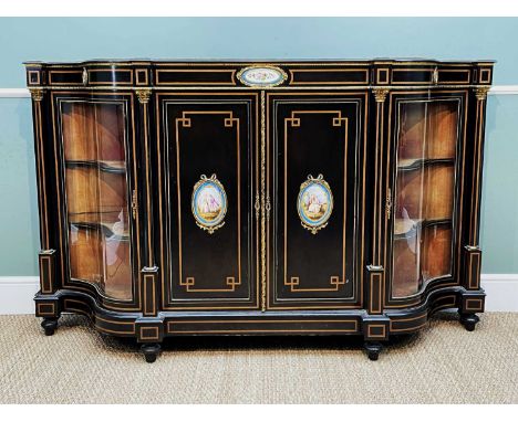 LATE 19TH CENTURY EBONISED WALNUT, PORCELAIN &amp; GILT METAL CREDENZA, of serpentine outline, applied with Sevres-style porc