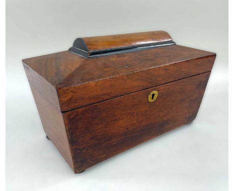 19TH CENTURY MAHOGANY TEA CADDY, of sarcophagus form, with part ebonised top, fitted interior, 29.5cm wideProvenance: content