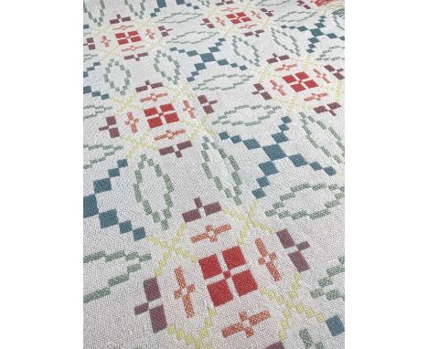 WELSH WOOLLEN REVERSIBLE TAPESTRY BLANKET with fringes to both ends, repeating geometric patterns in greens, reds, yellows an