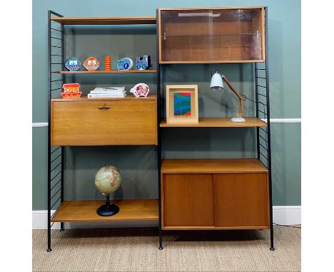 STAPLES 'LADDERAX' TEAK MODULER FURNITURE UNIT, with three black painted 'ladder' uprights and arrangement of shelves, cupboa