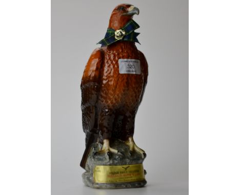 BENEAGLES BESWICK GOLDEN EAGLE WHISKY DECANTER FILLED WITH SCOTCH WHISKY 262/3FL/OZ, 70 PROOF.