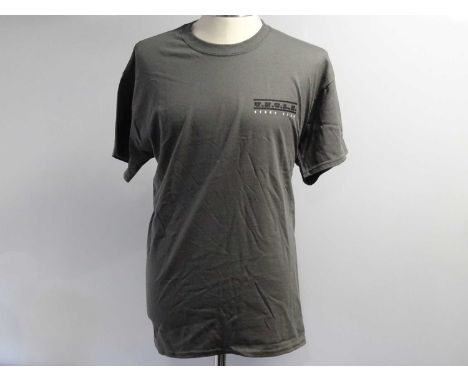 MAN FROM U.N.C.L.E. (2 in lot) Production Issued Clothing comprising two shirts - one short sleeved / one long sleeved - both